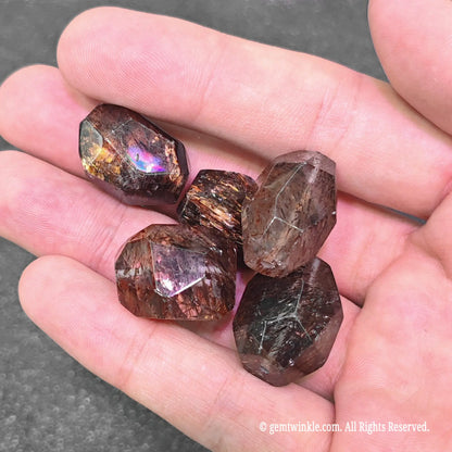 freeform super seven quartz beads featuring multi faceted polished surface and metallic flash