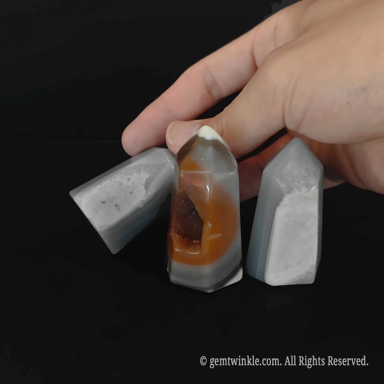 Close up comparison of various 5cm open pocket crystal towers showing unique druzy cave depths and shapes