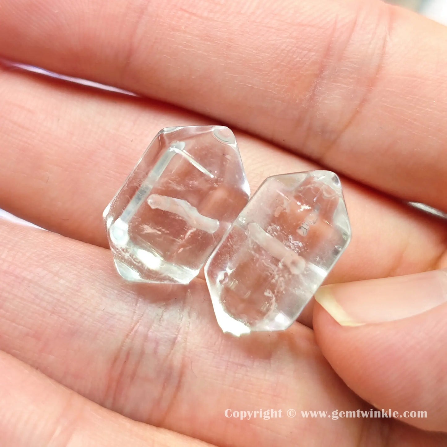 genuine-rock-crystal-double-terminated-bead-handheld-view