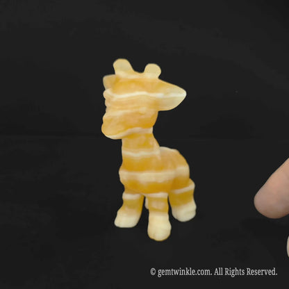Handheld calcite giraffe figurine