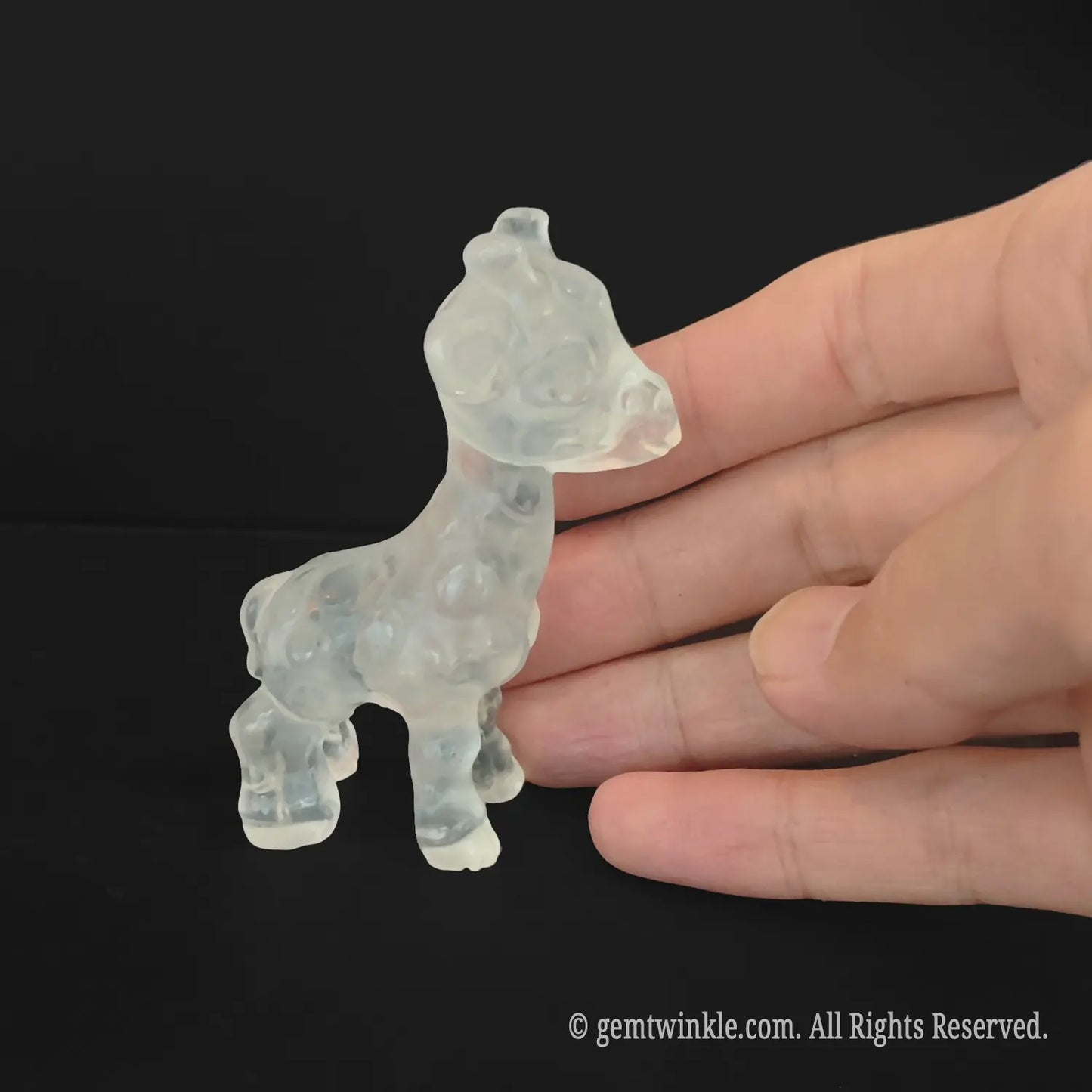Handheld milk quartz giraffe figurine
