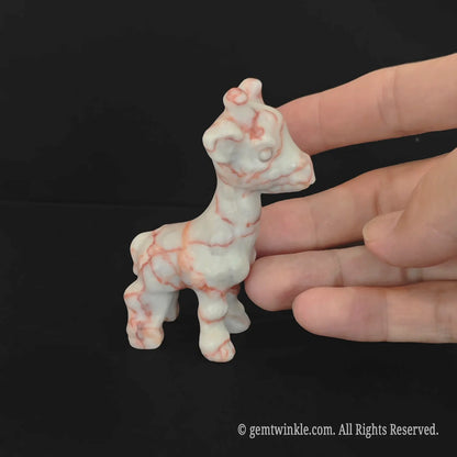 Handheld red striped stone giraffe figurine