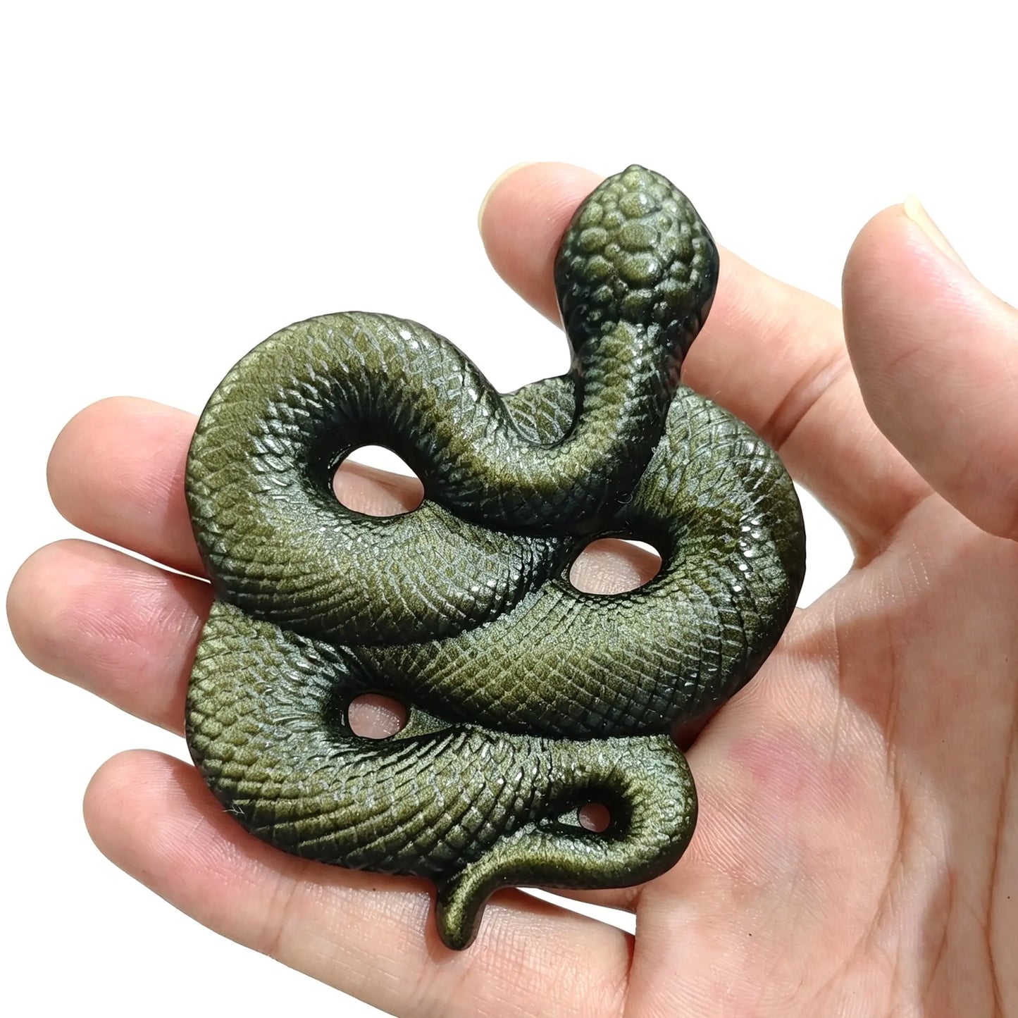 Gold sheen obsidian snake figurine 8cm held in hand showing detailed carved scales and raised serpent head