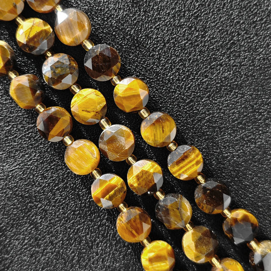 Strands of golden tiger eye hexagram disc beads with star cut facets