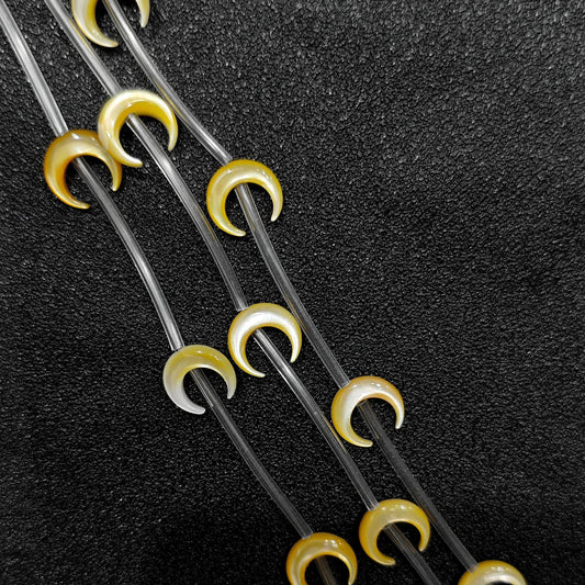 Golden yellow mother of pearl crescent moon beads full strand view