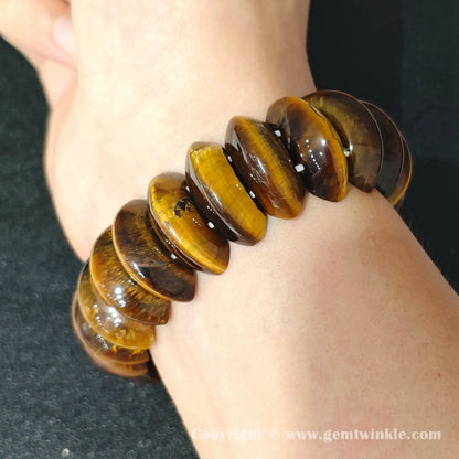 yellow tigers eye crescent bead bracelet worn on wrist showcasing 18cm comfortable fit