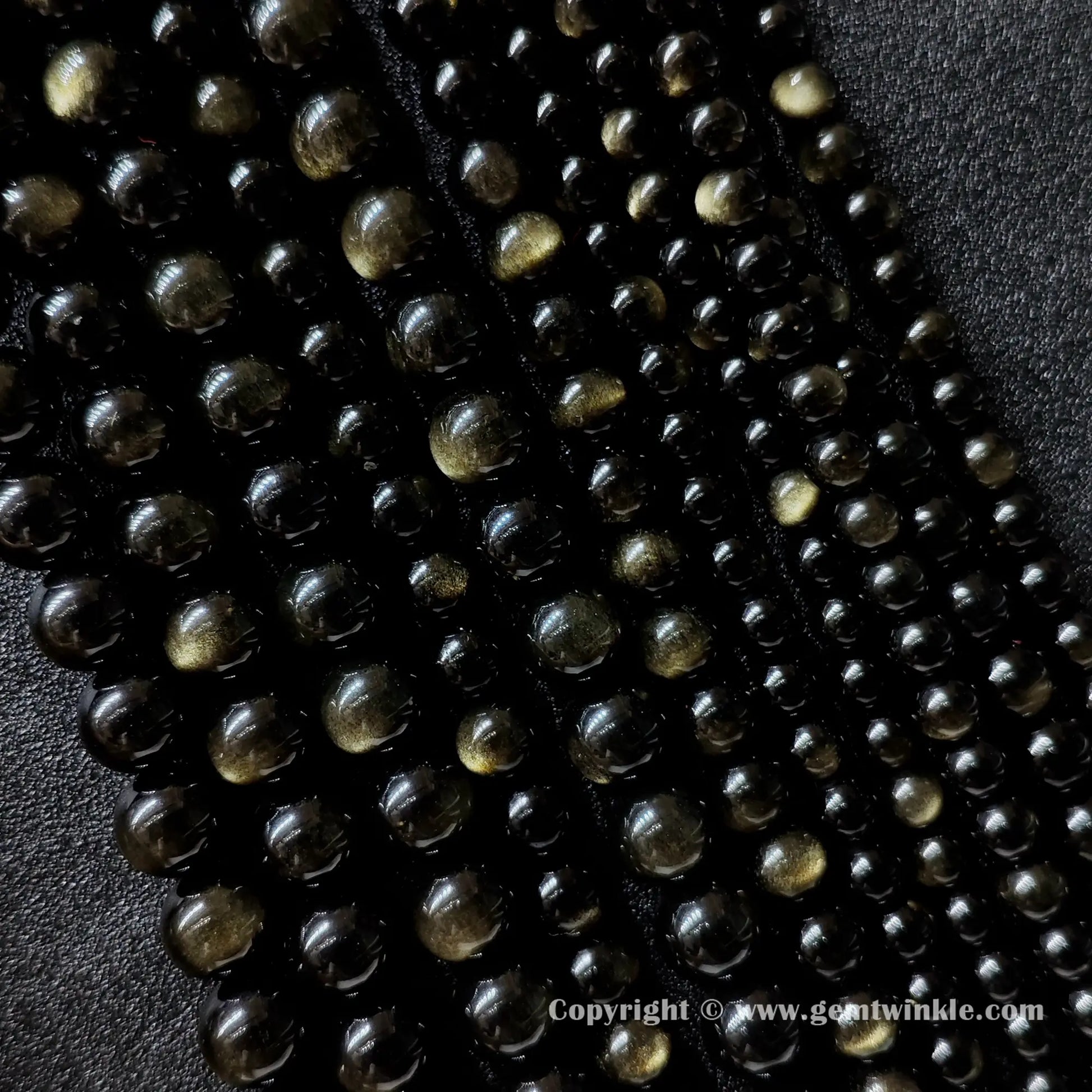 Multiple parallel Grade A gold sheen obsidian round bead strands