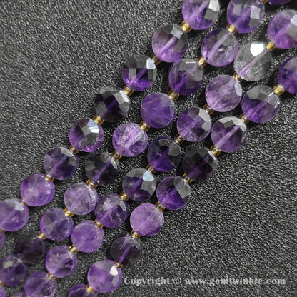Close up view of Grade B amethyst faceted flat disc beads showing purple quartz