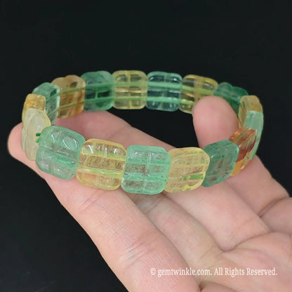 top view of 12mm cross grooved green and yellow fluorite square segment bracelet 17cm