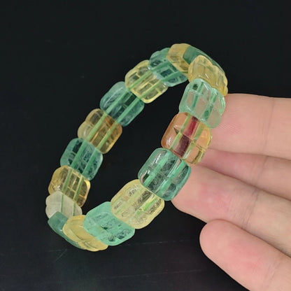 green and yellow fluorite stretch bracelet with 12mm grid carved square beads