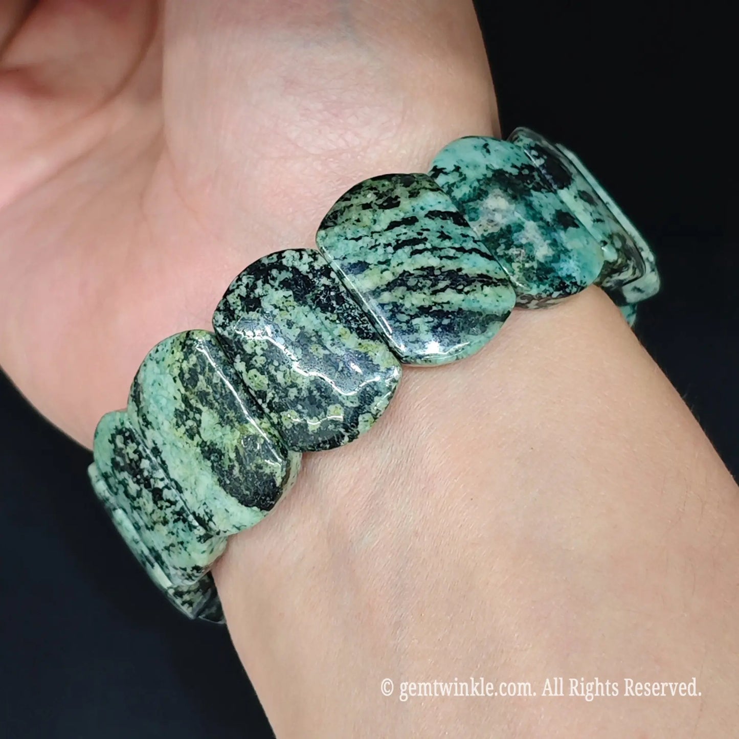 Green zebra jasper large block cuff bracelet styled on wrist displaying comfortable fit and bold 24mm bead profile