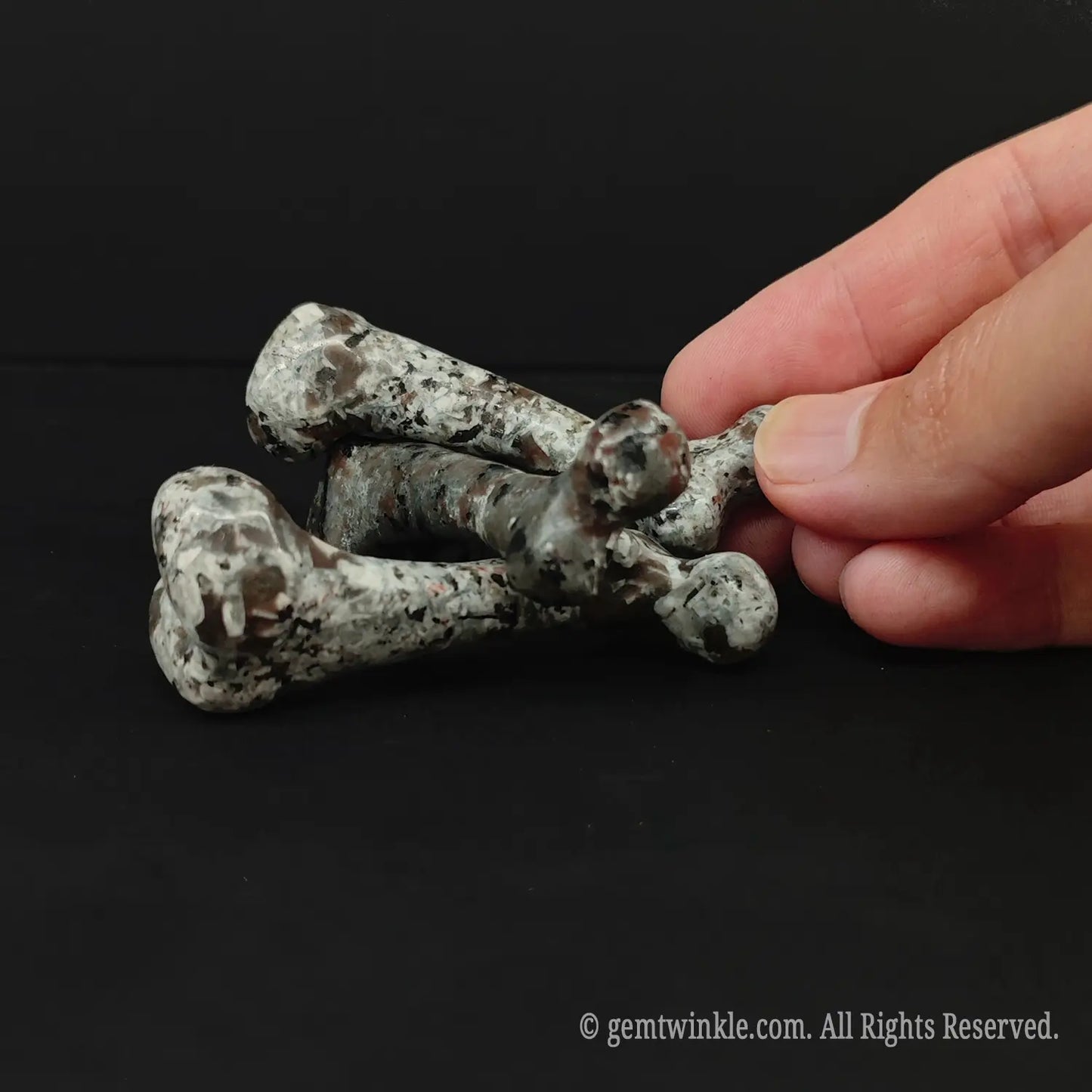 grey-veined-stone-skeletal-bone-carving