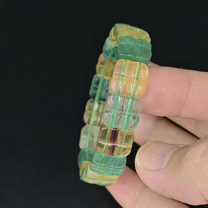 side view of 17cm womens green and yellow fluorite grid carved square bead bracelet