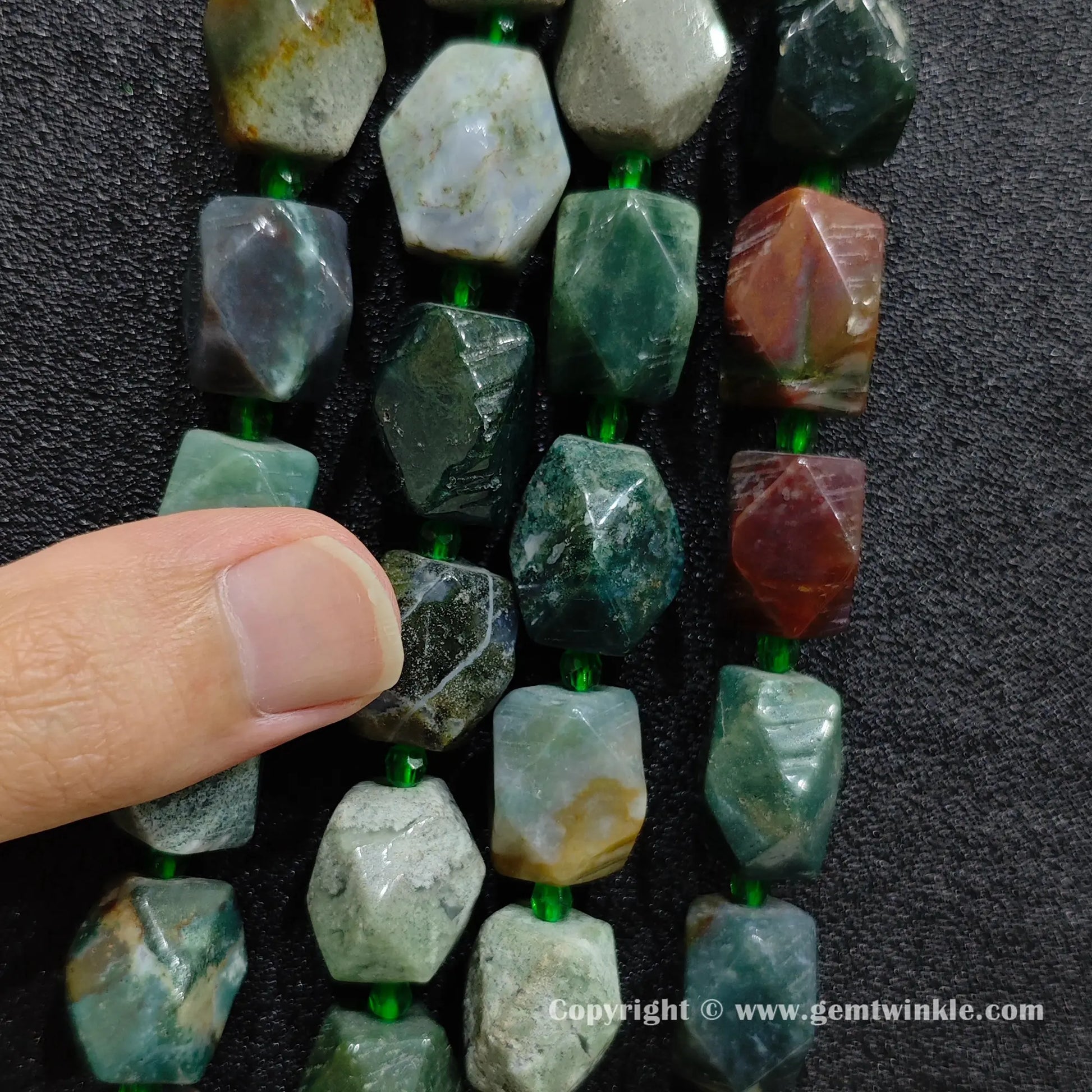 hand scale preview of 18mm ocean jasper faceted barrel beads
