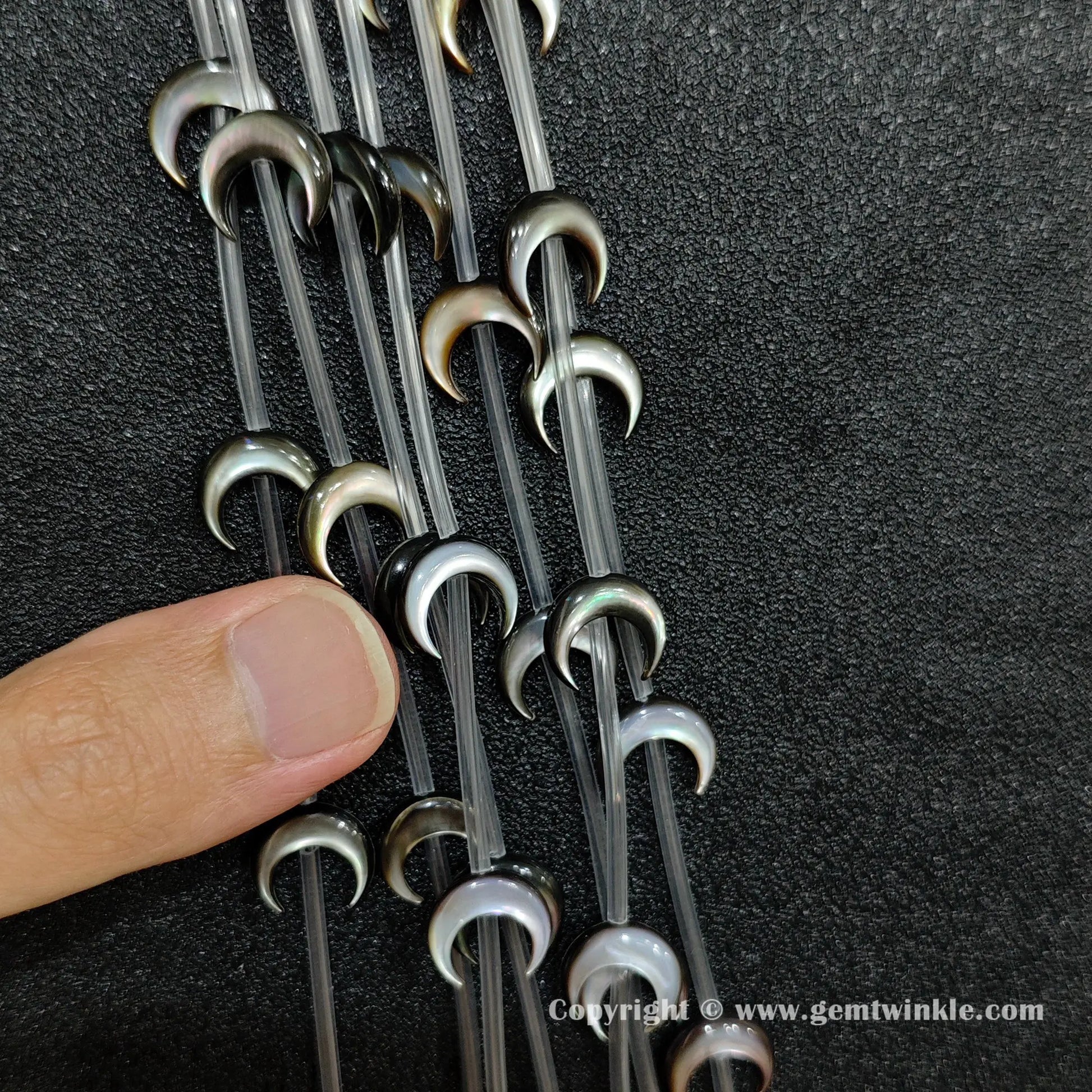 Handheld preview showing 14mm black mother of pearl moon beads
