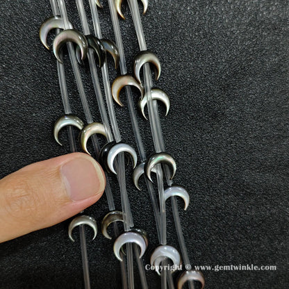 Handheld preview showing 14mm black mother of pearl moon beads