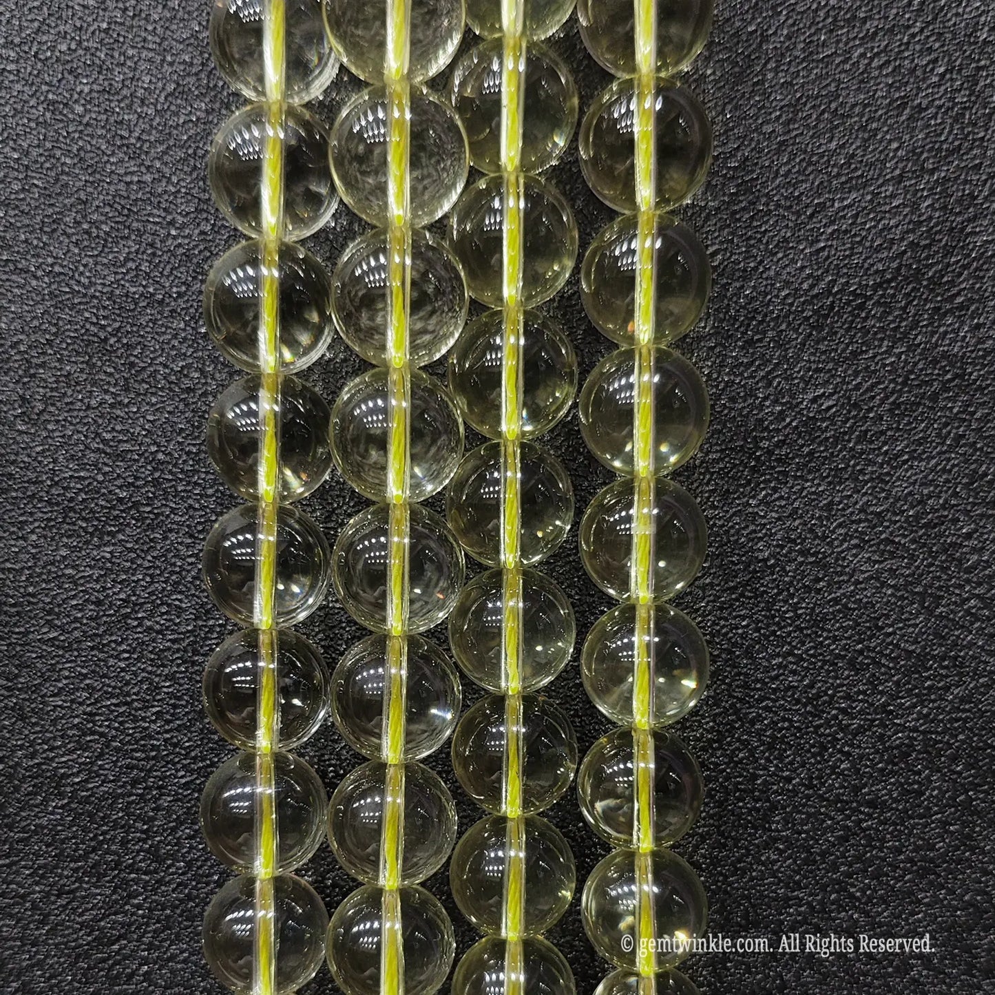 Boutique preview of high clarity 12mm lemon citrine quartz strands for elegant minimalist luxury bracelets