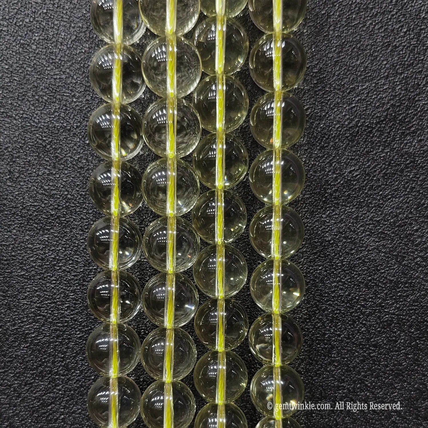 Boutique preview of high clarity 12mm lemon citrine quartz strands for elegant minimalist luxury bracelets