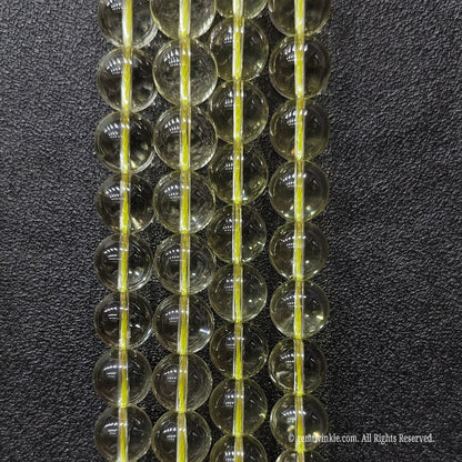 Boutique preview of high clarity 12mm lemon citrine quartz strands for elegant minimalist luxury bracelets