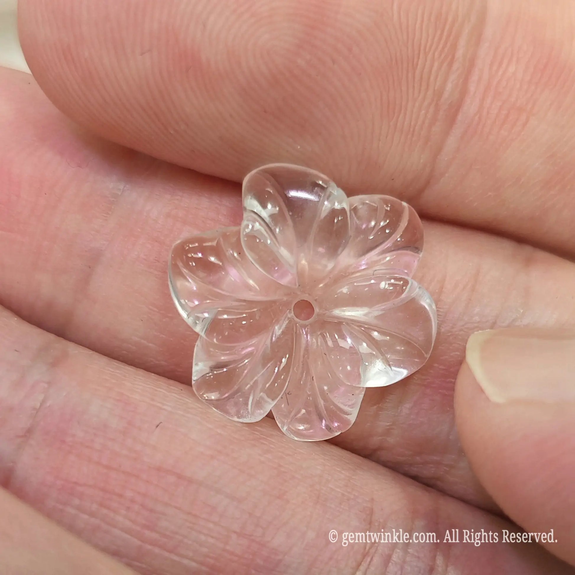 High clarity clear quartz carved flower bead detail showing clear crystal body with minimal inclusions
