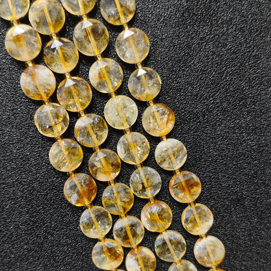 Strand of honey yellow citrine hexagram disc beads with star faceted surface