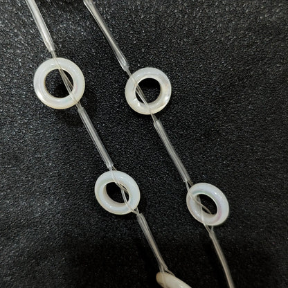 Laminated white mother of pearl donut ring beads full strand view