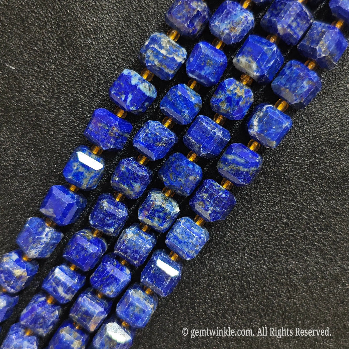 Macro close-up showing the deep royal blue saturation and starry pyrite inclusions of lapis blocks