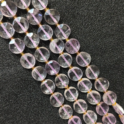Strands of high clarity lavender amethyst faceted coin beads showing clear light purple quartz