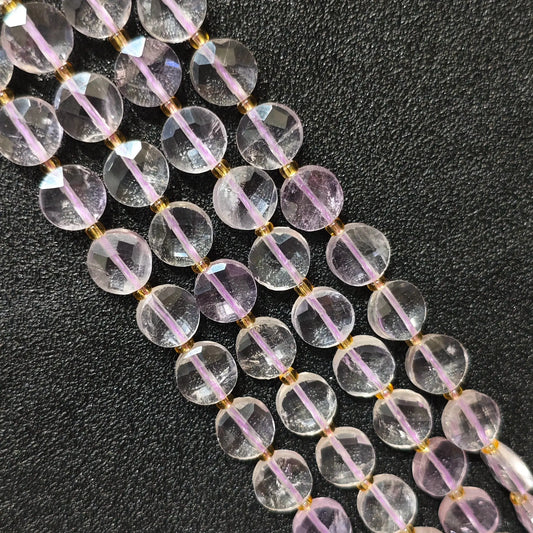 Strands of high clarity lavender amethyst faceted coin beads showing clear light purple quartz