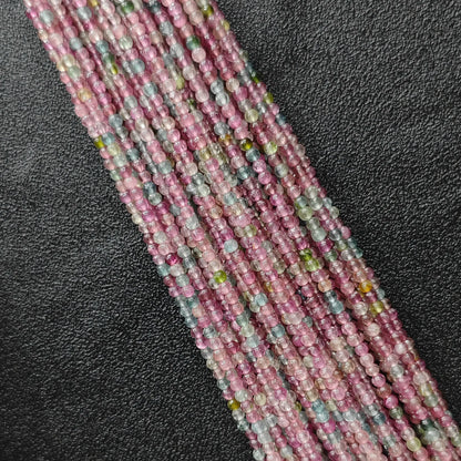 Light color pastel multi color tourmaline 2.5mm tiny gemstone beads close up view