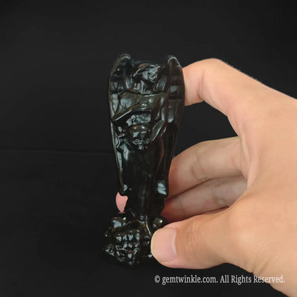 side profile of gothic lucifer carving