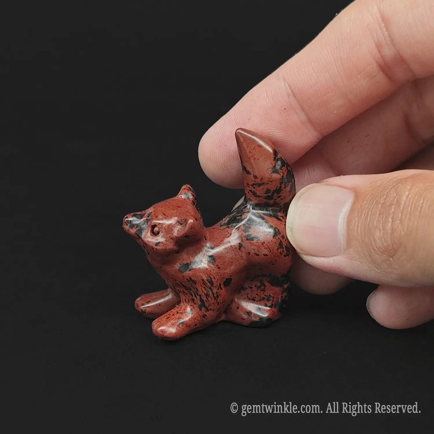 Rich Mahogany Obsidian puppy dog mini figurine in 4cm size showing brick red and black patterns for crystal gift shop stock