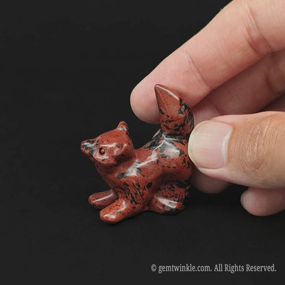 Rich Mahogany Obsidian puppy dog mini figurine in 4cm size showing brick red and black patterns for crystal gift shop stock