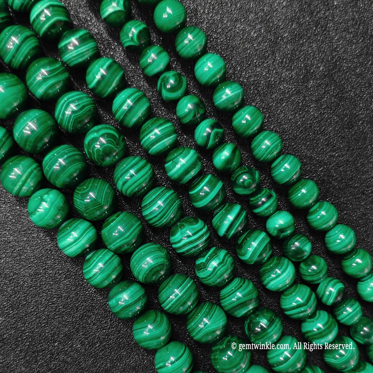Resin micro stabilized natural malachite mineral bead strands from direct sourcing wholesale market inventory