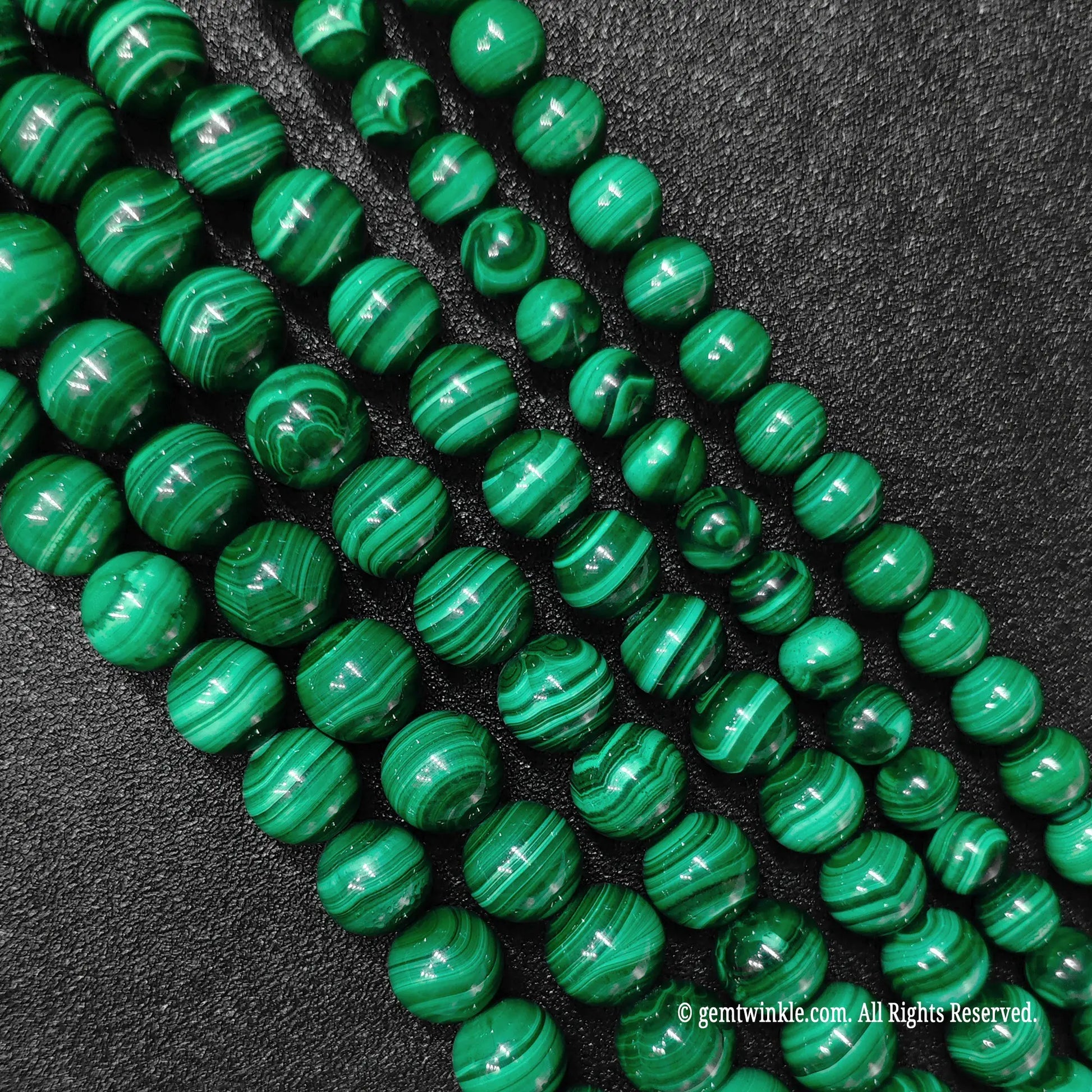 Resin micro stabilized natural malachite mineral bead strands from direct sourcing wholesale market inventory