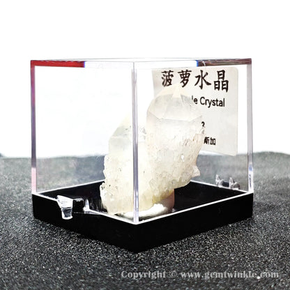 Left angled perspective displaying surrounding secondary white crystal points on raw opaque quartz