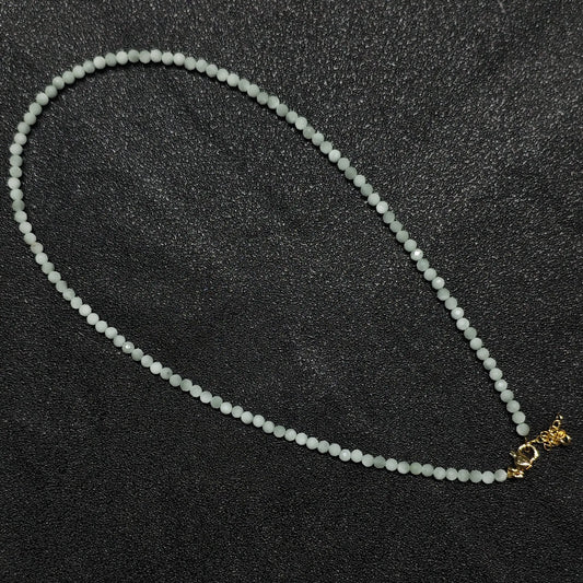 Milky mint green angelite gemstone collar necklace featuring 3mm opaque faceted beads and gold extension chain