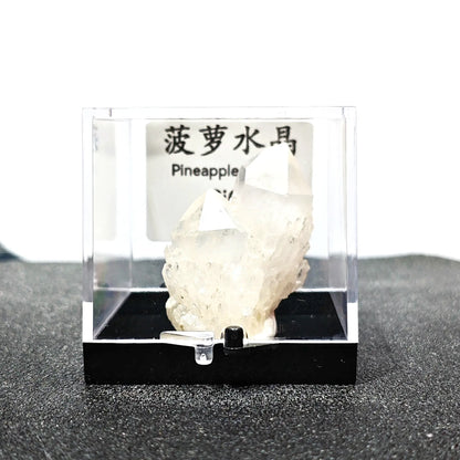 Natural opaque milky pineapple quartz crystal cluster mounted in 9cm acrylic display box with ID label