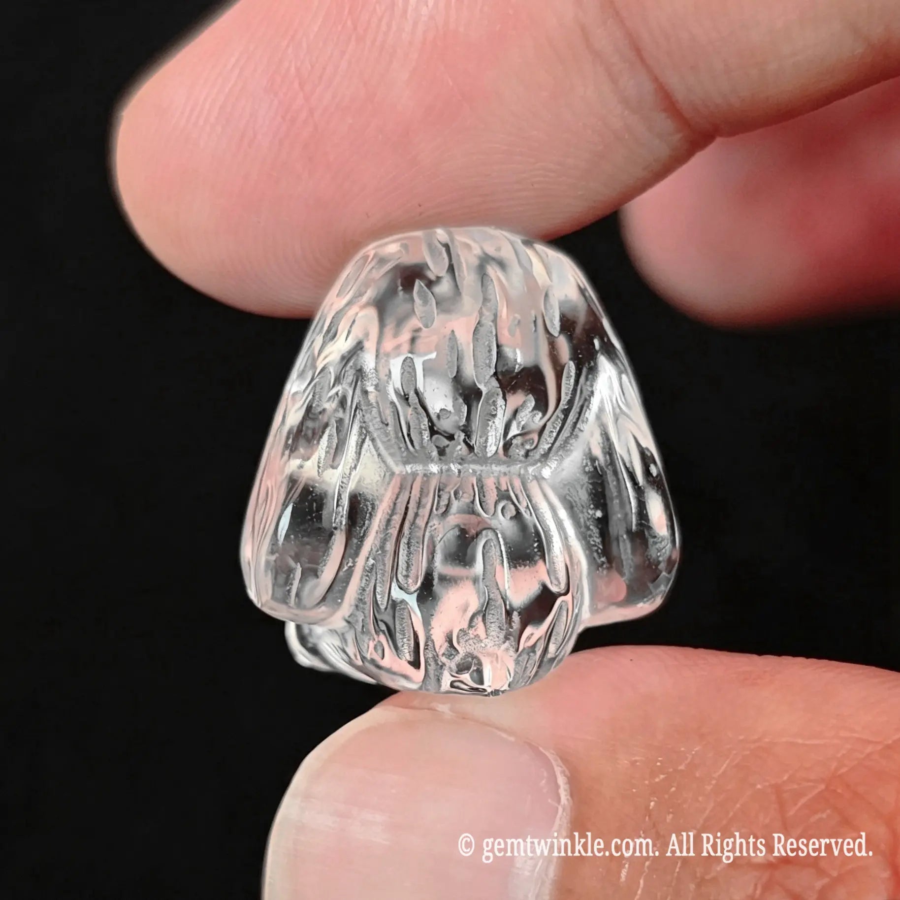 Mini precision carved clear quartz bunny figurine displayed on fingertips for accurate 2.5cm size reference