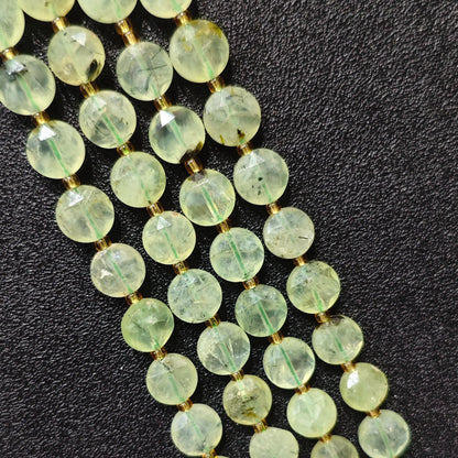 Strands of mint prehnite hexagram disc beads with natural black epidote inclusions