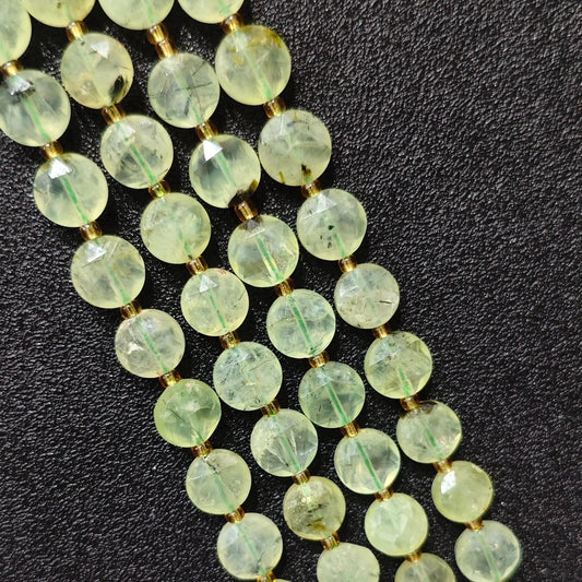 Strands of mint prehnite hexagram disc beads with natural black epidote inclusions