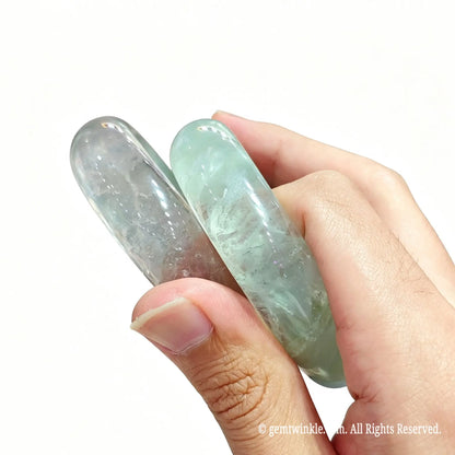 Model wearing a mint green fluorite solid gemstone band highlighting elegant wrist fit and pastel sheen