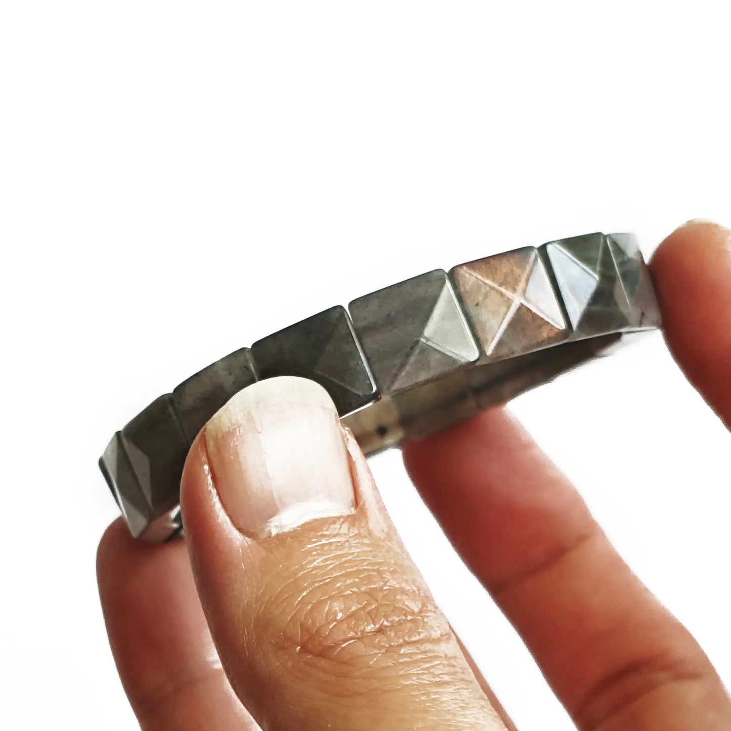Side view of moonstone bracelet showing depth and geometric facets of 10mm square beads