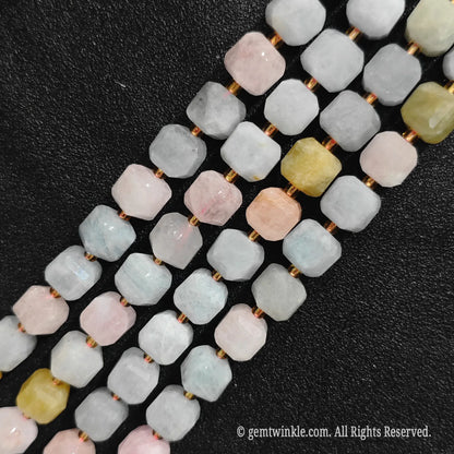 Close up view highlighting the soft pastel pink and peach tones of morganite blocks