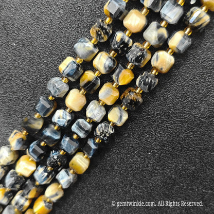 Macro close-up showing the blue and golden shifting optical shimmer of dreamy tiger eye blocks