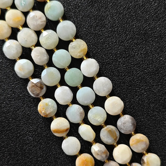 Strands of multicolor amazonite hexagram disc beads with star cut facets
