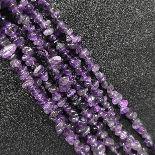 Natural amethyst freeform chip beads in 5 to 10mm size on 75cm long strand