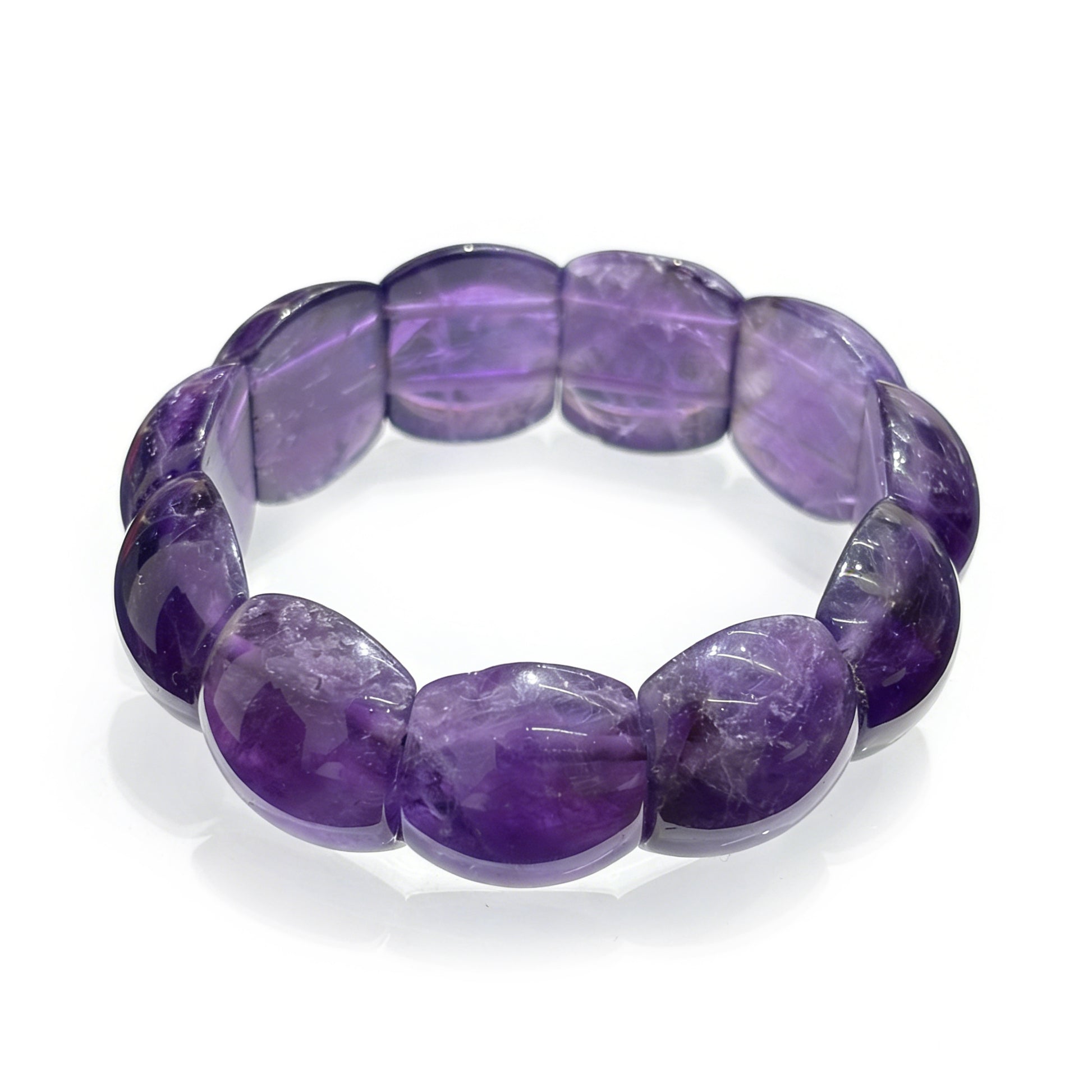 Close up of a natural amethyst rectangle bead bangle bracelet, showcasing the faceted purple beads and elastic stretch design.