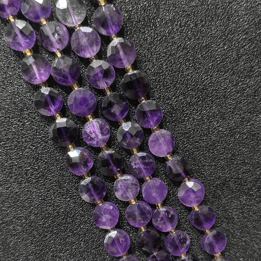 Strands of natural B grade amethyst faceted coin beads in flat disc shape