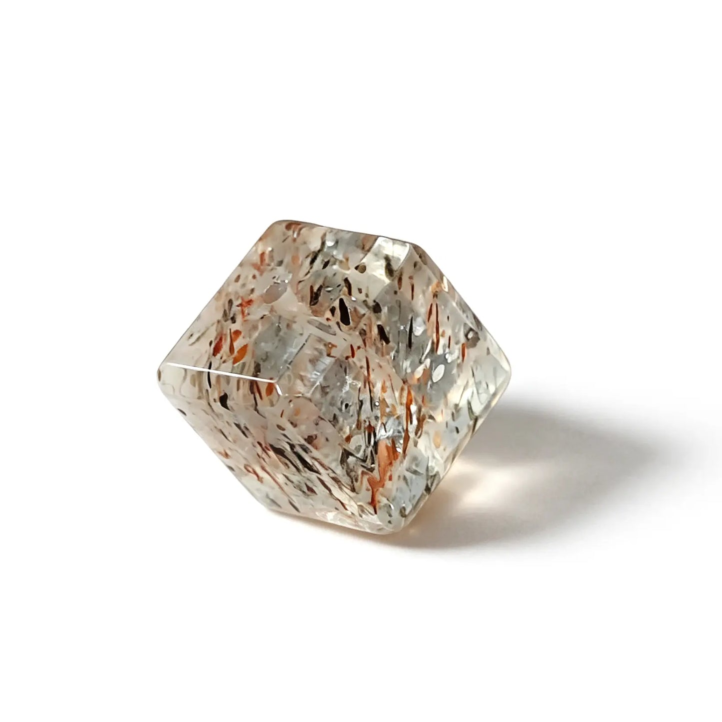 Natural black gold super seven quartz cube bead displaying rich mineral inclusions on white background